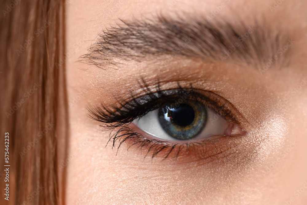 Young woman with blue eyes, closeup