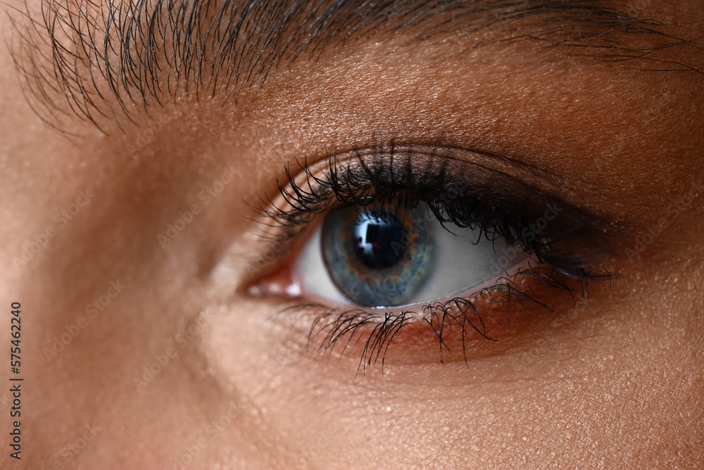 Young woman with blue eyes, closeup