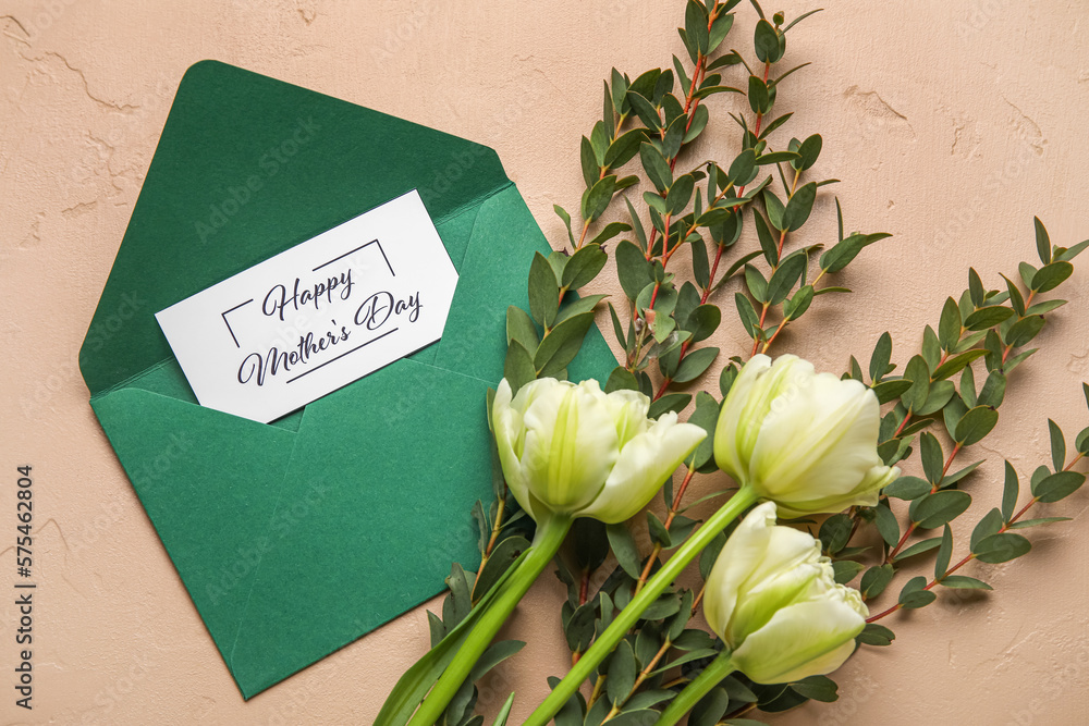 Card with text HAPPY MOTHERS DAY, beautiful tulip flowers and eucalyptus branches on color backgrou