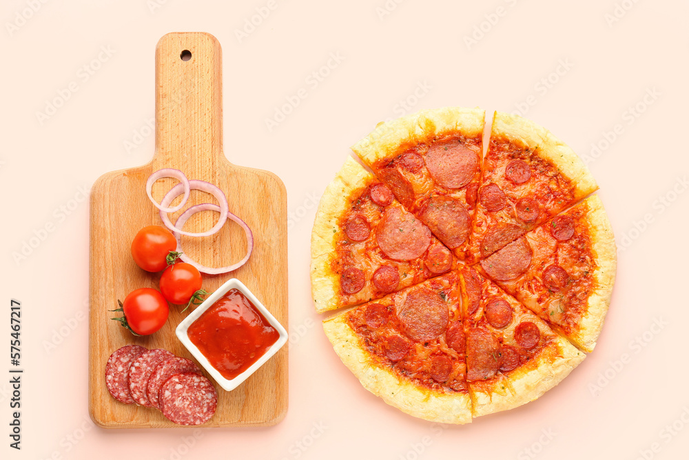 Delicious pepperoni pizza and board with ingredients on pink background