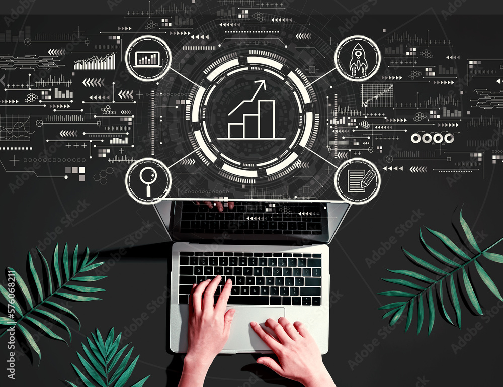 Business growth analysis with person using a laptop computer