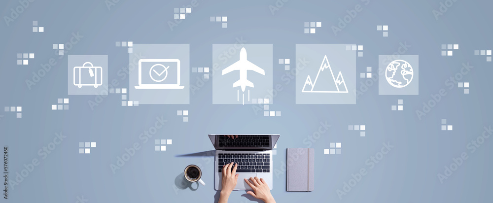 Flight ticket booking concept with person working with a laptop