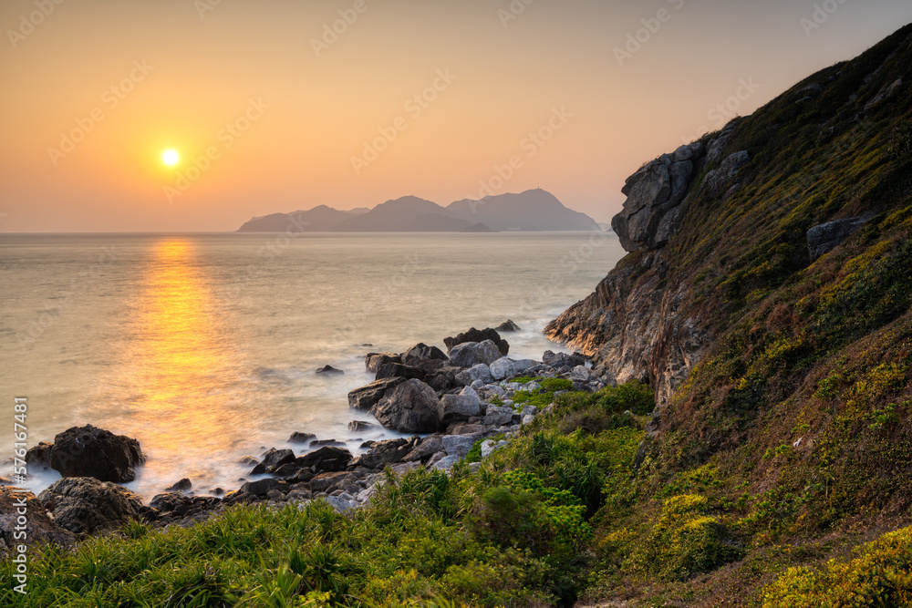 sunrise over the sea and mountains