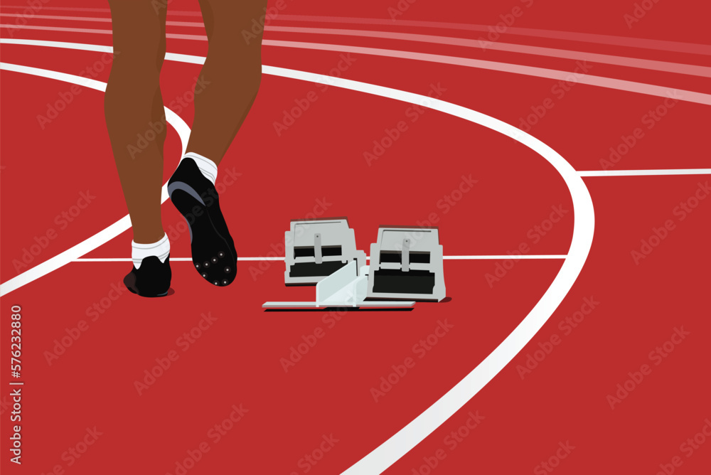 runner athlete and starting blocks on running track stadium