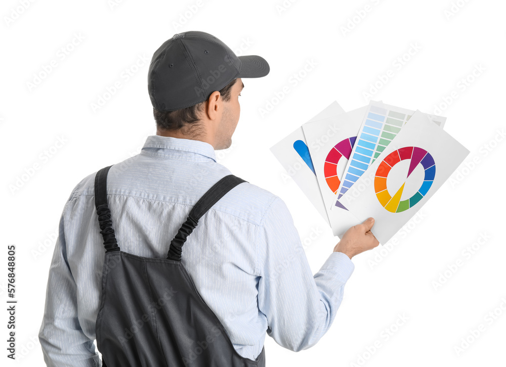 Male painter with color palettes on white background, back view