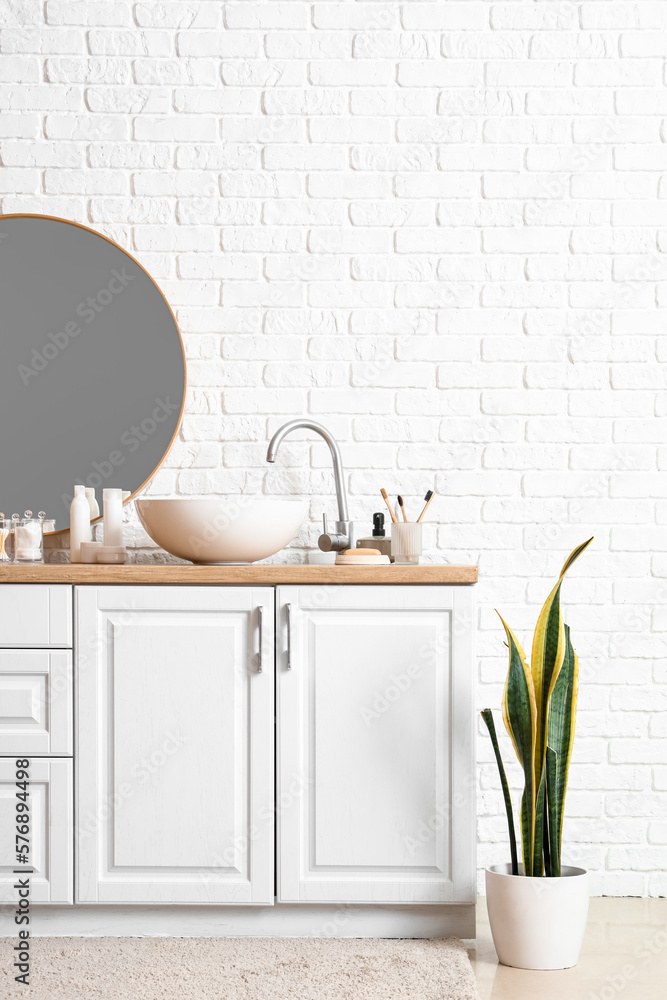 Interior of bathroom with sink and mirror