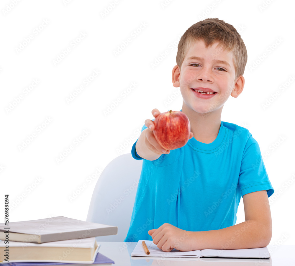 A young student boy enjoys a healthy snack of an apple while working hard to complete his math homew