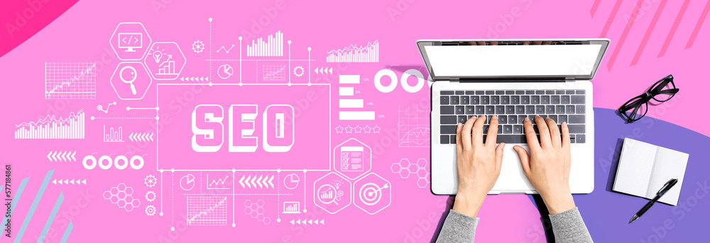 SEO - Search Engine Optimization theme with person using a laptop computer