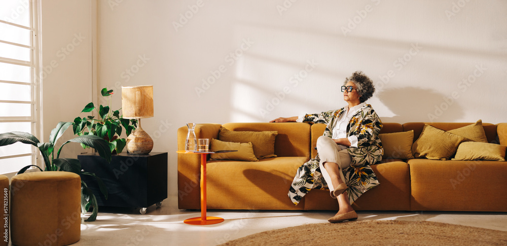 Thoughtful businesswoman sitting in an office lobby