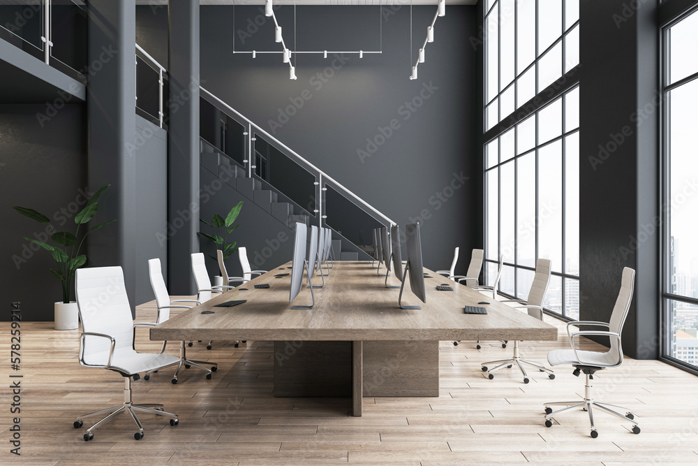 Modern interior design of spacious office hall with wooden meeting table surrounded by light stylish