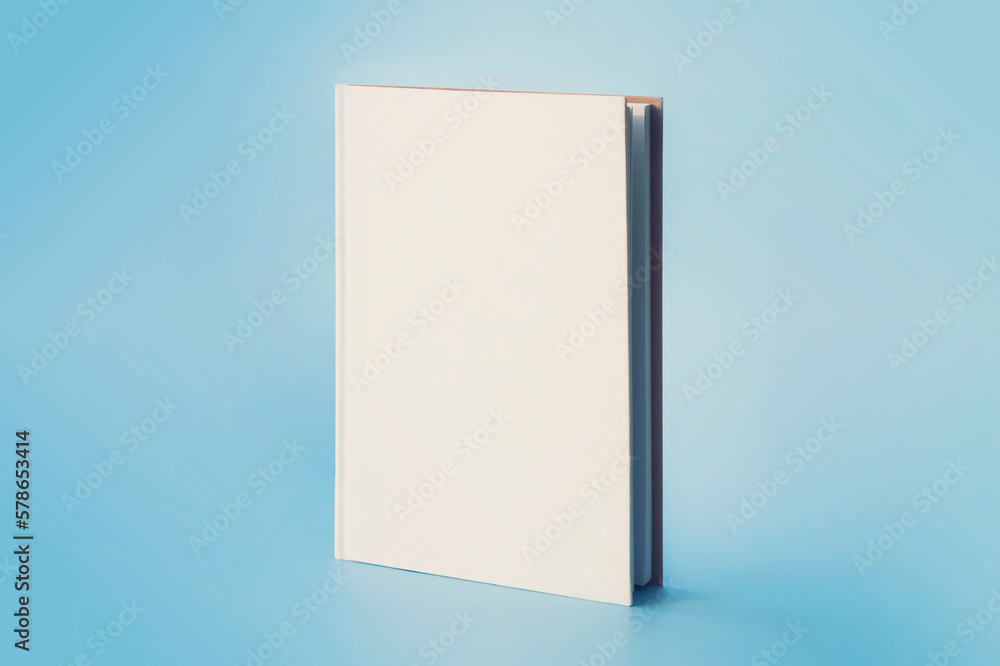 a white book on a blue background. Empty space on cover for design and text