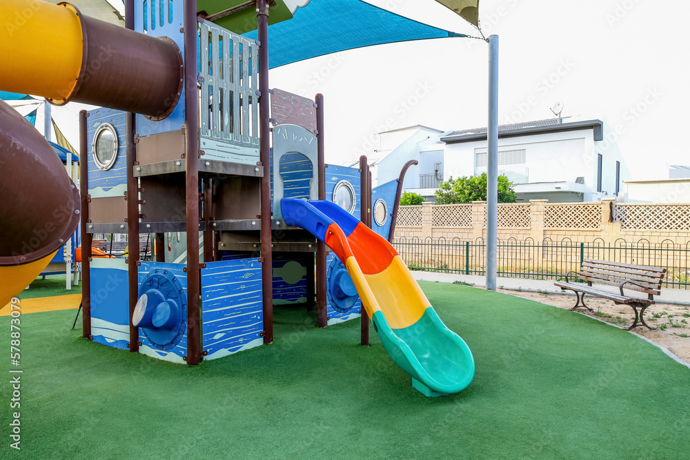 Slide in shape of ship on childrens playground