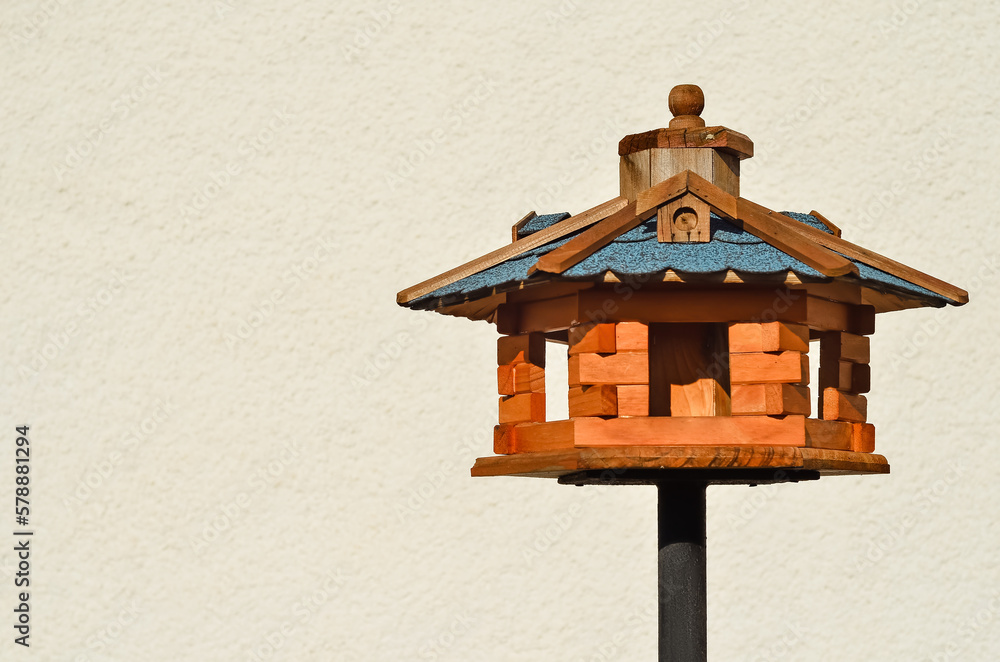 View of wooden bird house outdoors, closeup