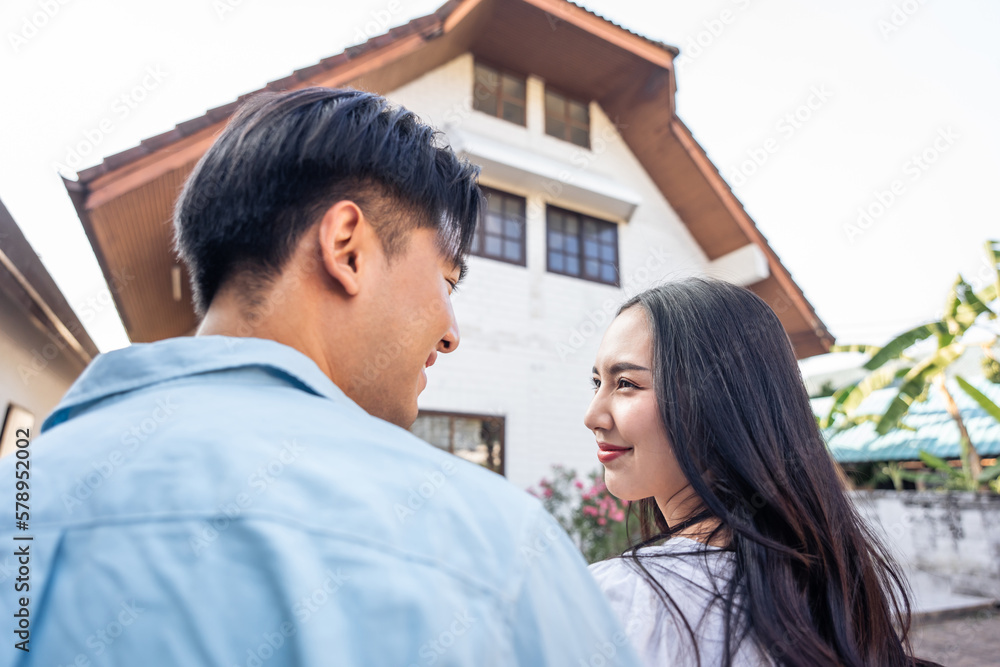 Asian young happy new marriage couple moving to new house together. 