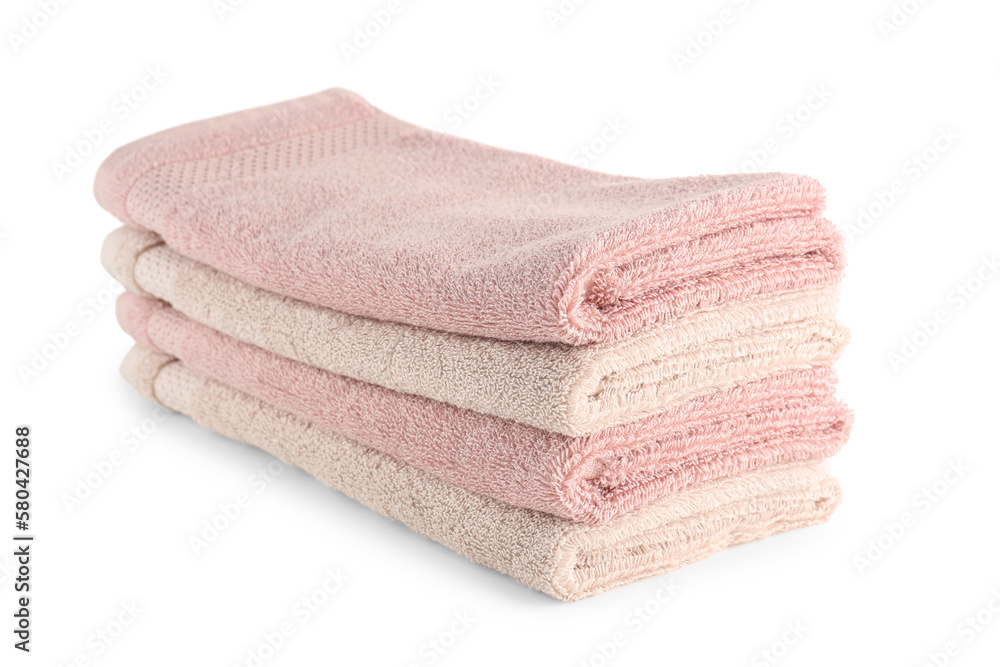 Stack of folded soft towels isolated on white background