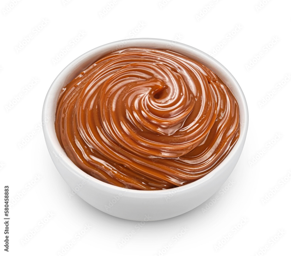 Melted caramel cream isolated on white background, full depth of field