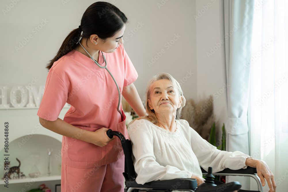 Young woman doctor touching senior patient at nursing home,give support empathy,Psychological help c