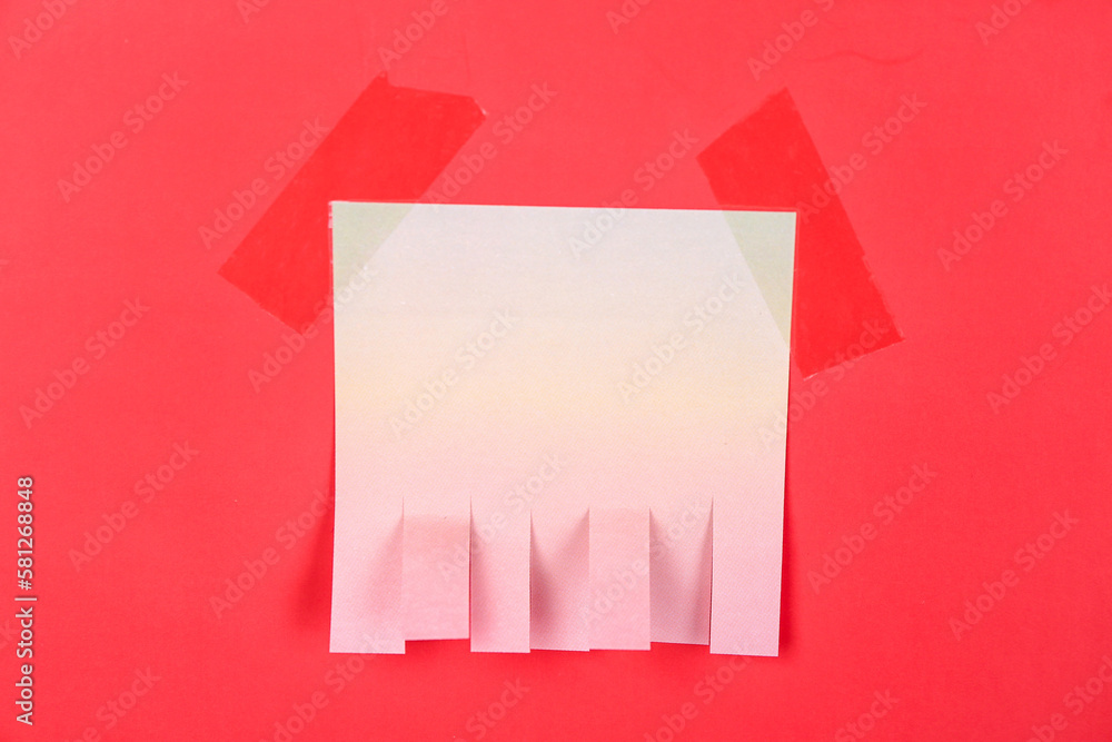 Blank paper tear-off ad on red background