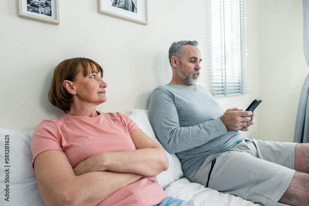 Phone addiction, Caucasian husband doesnt pay attention to his wife.