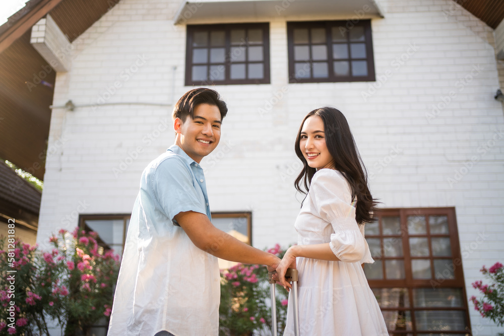 Portrait of Asian young new marriage couple move to new house together. 