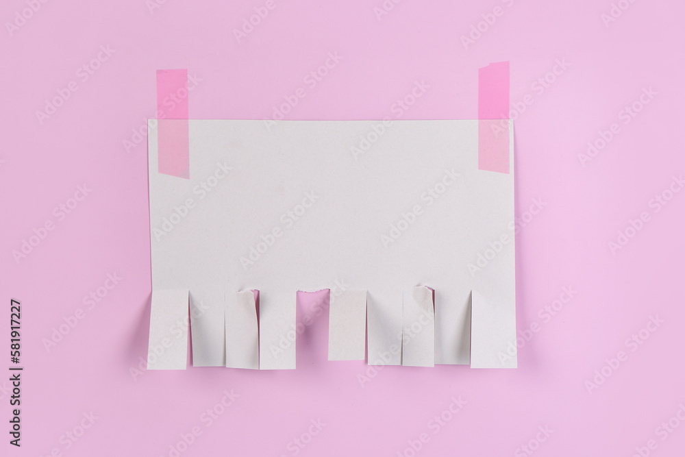 Blank paper tear-off ad on pink background