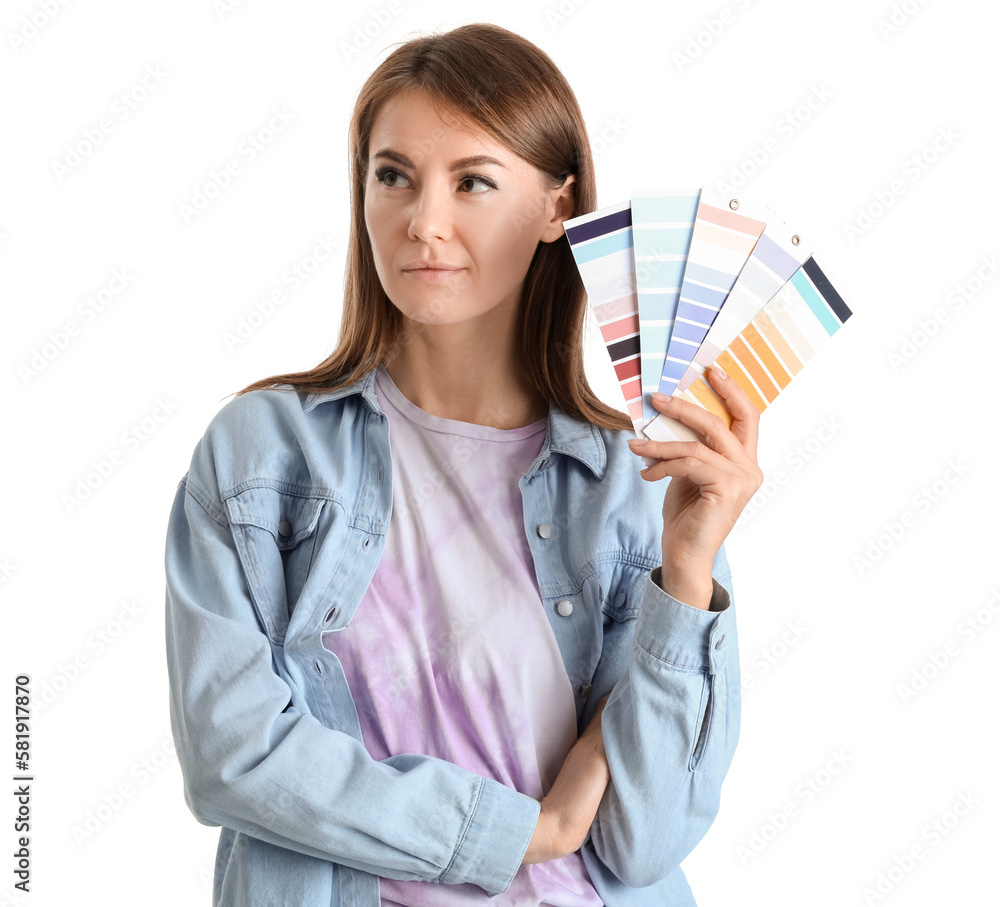 Beautiful woman with paint color palettes on white background