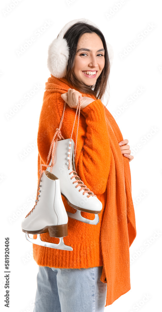 Pretty young woman with ice skates isolated on white background