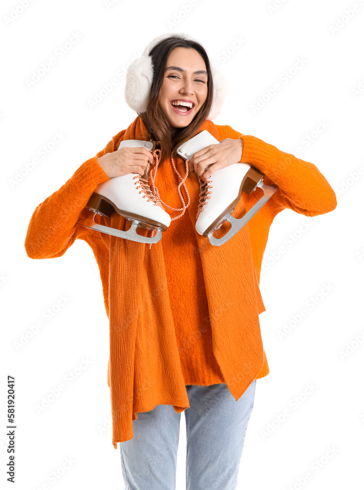 Pretty young woman with ice skates isolated on white background