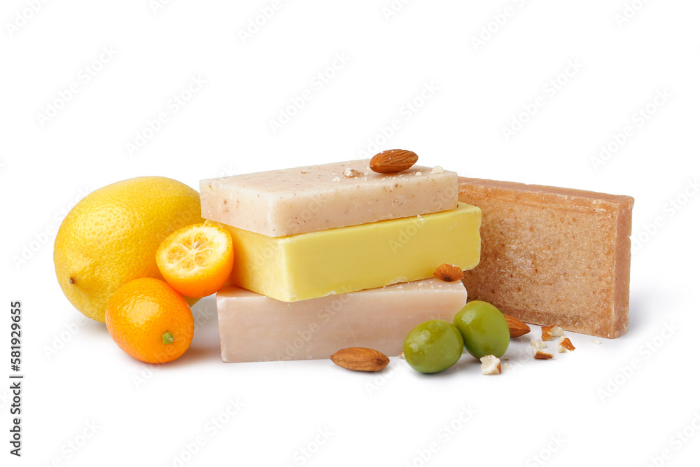 Composition with soap bars and natural ingredients on white background