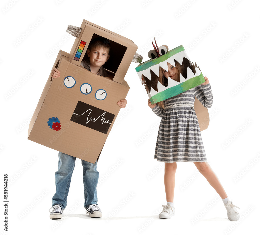 Little children in cardboard costumes on white background