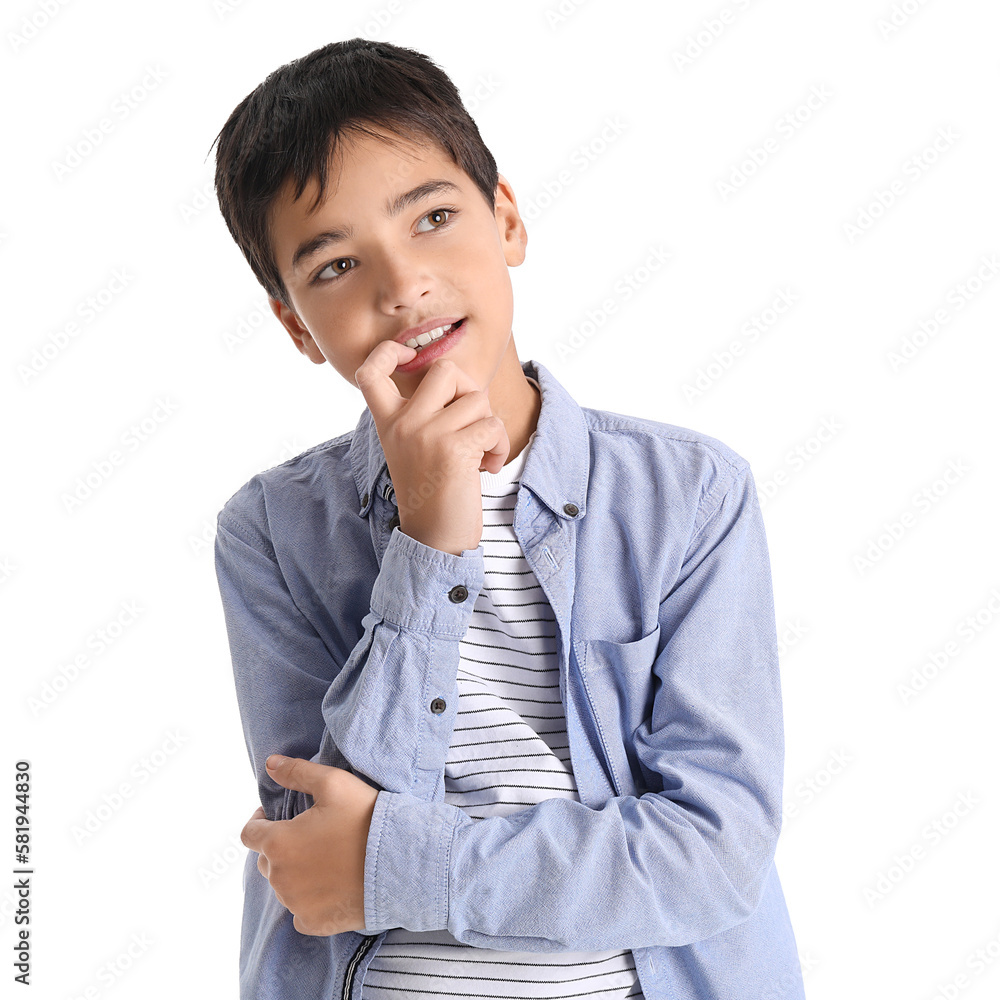 Little boy biting nails on white background