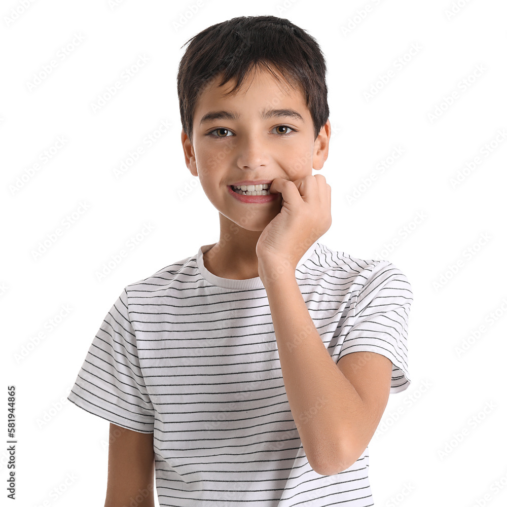 Little boy biting nails on white background