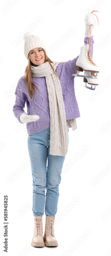 Pretty young woman with ice skates isolated on white background