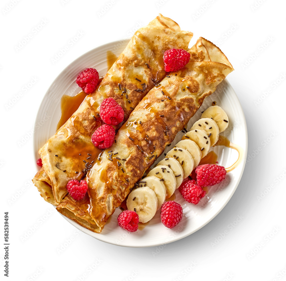 freshly baked crepes with fresh fruits and caramel sauce