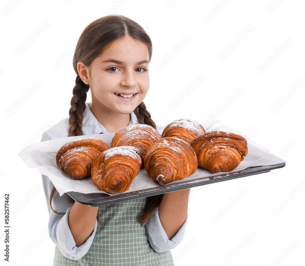 Little baker with tray of tasty croissants on white background