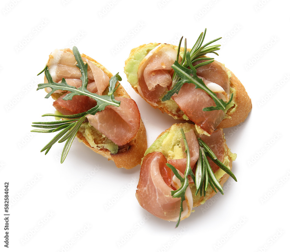 Tasty bruschettas with ham isolated on white background