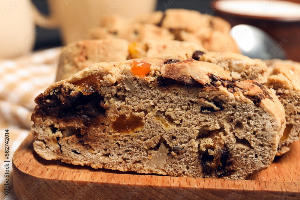 Delicious biscotti cookies on board, closeup