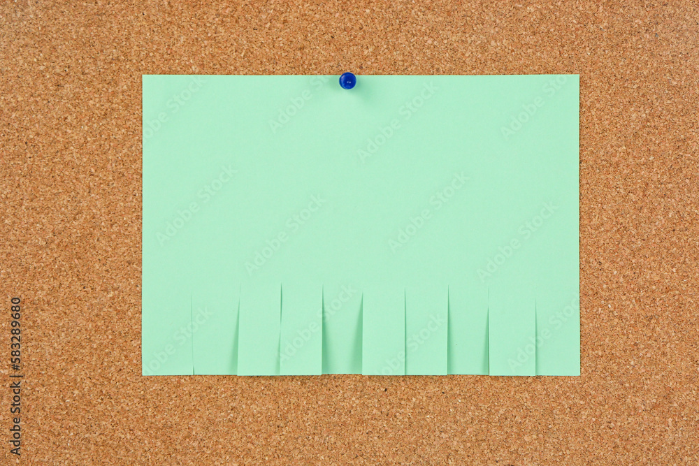 Blank paper tear-off ad on pinboard