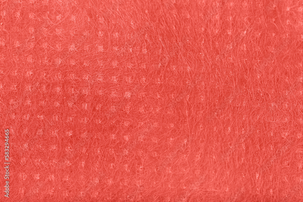 Closeup view of coral fabric texture as background