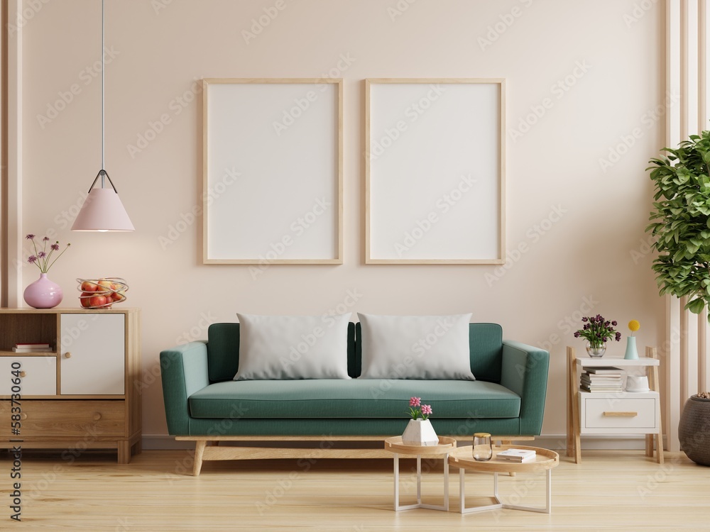 Mock up poster frame in modern interior with green sofa and decoration minimal.