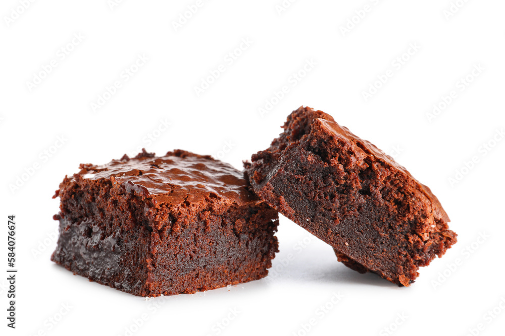 Pieces of tasty chocolate brownie isolated on white background