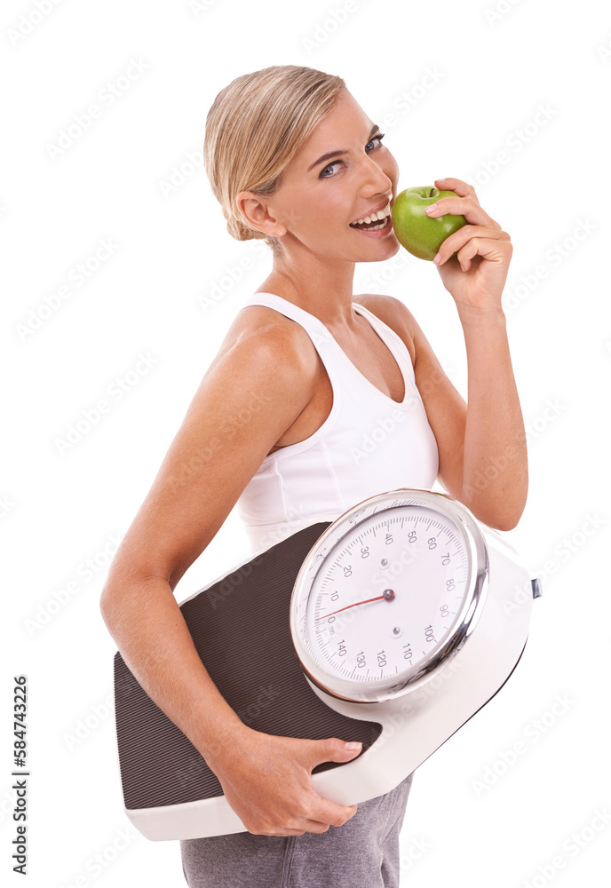 Woman, eating and apple with scale for diet, weight loss or healthy nutrition on an isolated and tra