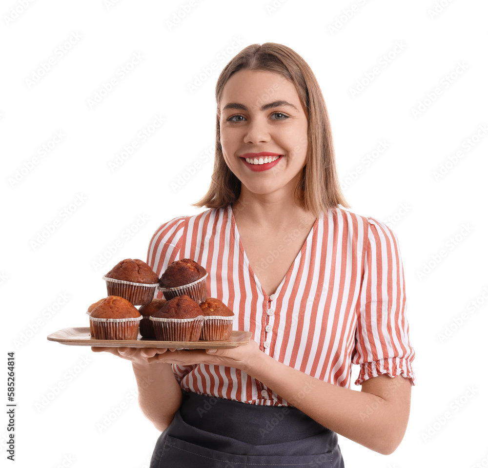 Female baker with tray of tasty cupcakes on white background