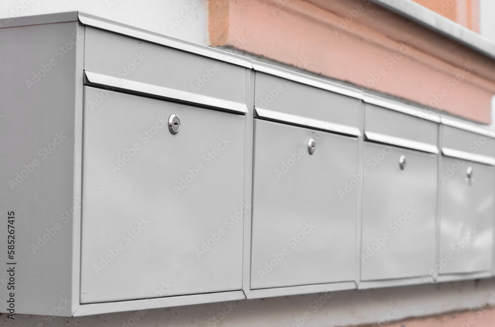 View of mailboxes on building wall, closeup