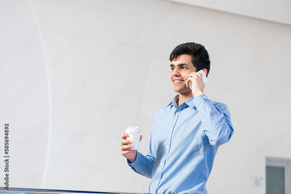 young businessman talking on his cell phone