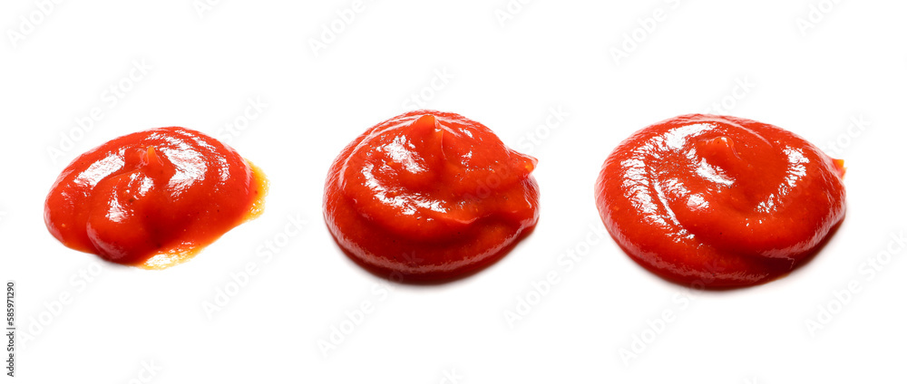 Drops of tasty ketchup isolated on white background