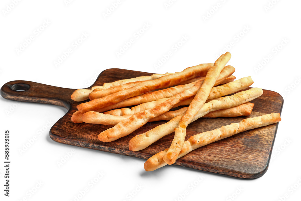 Wooden board with tasty Italian Grissini on white background