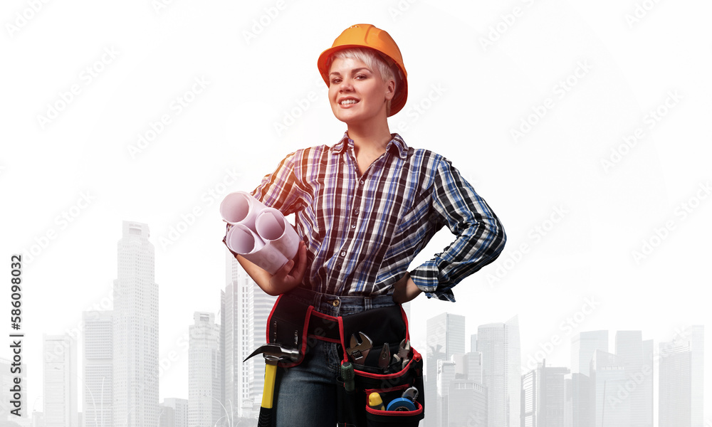 Attractive female engineer in hardhat