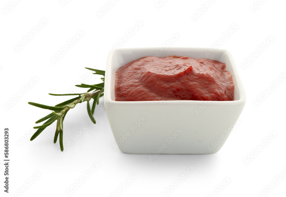 Bowl with tasty tomato paste and rosemary on white background