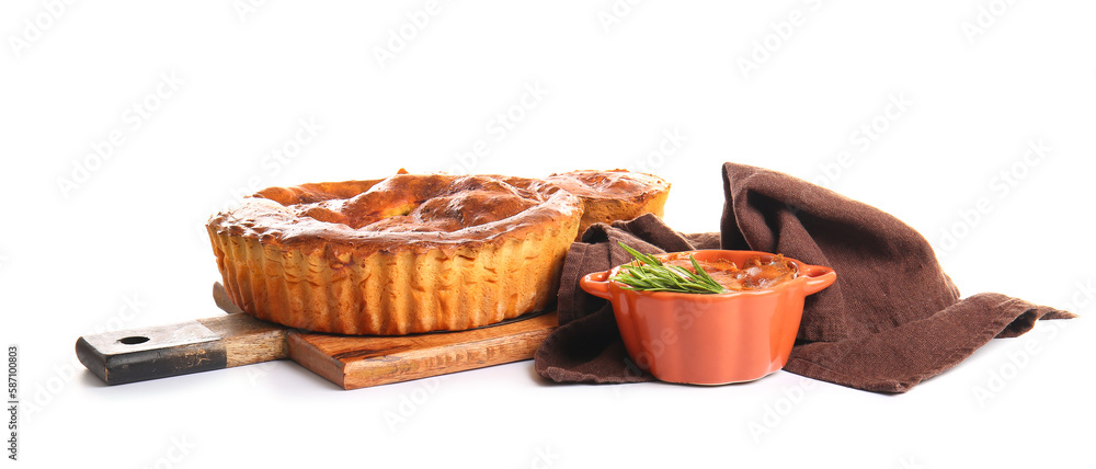 Board and delicious meat pies isolated on white background